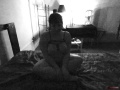 RioTDoll - Dungeon - 01 sitting on bed.jpeg