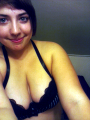 RioTDoll - Smiling in bathroom.png
